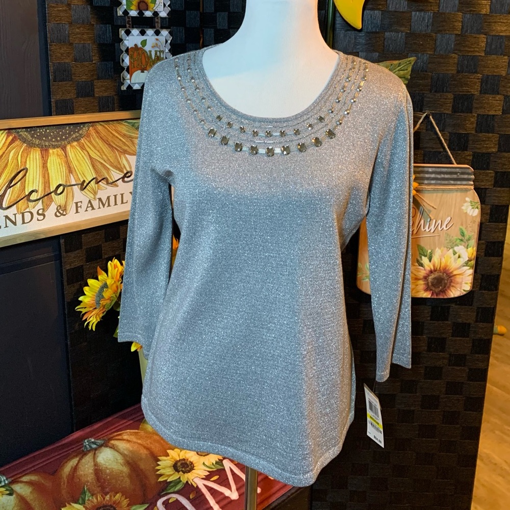 Women’s gray blouse with stones around neckline size medium.